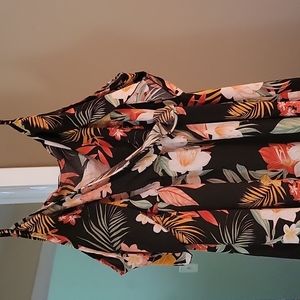 Floral dress with split on right side, off the shoulder design. Long in length